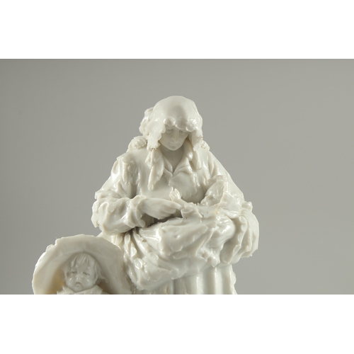 1092 - A GOOD VINCENNES SEVRES WHITE PORCELAIN GROUP of a mother, baby and child by her side, on a square o... 