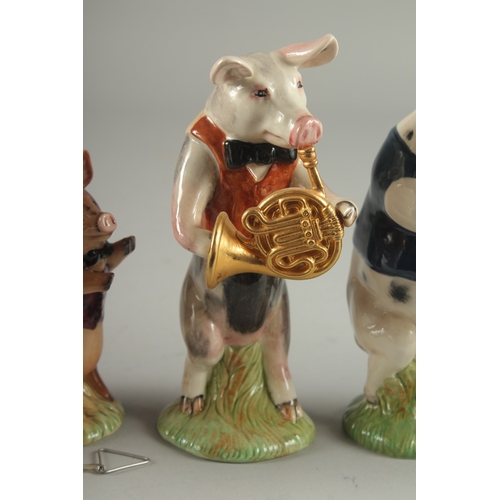 1093 - A COLLECTION OF ELEVEN BESWICK POTTERY PIGS (11)