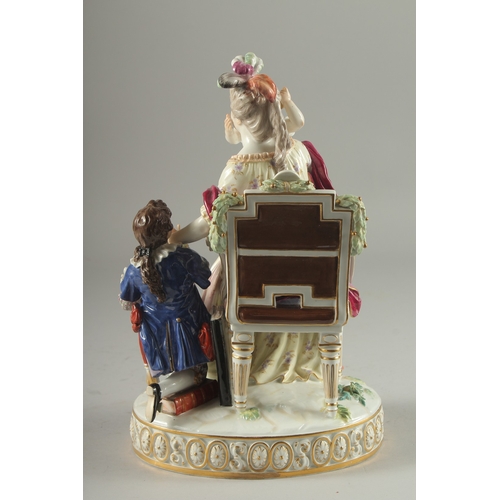 1098 - A VERY GOOD AND FINE 19TH CENTURY MEISSEN GROUP, a lady seated in a chair, a child on her lap, a you... 