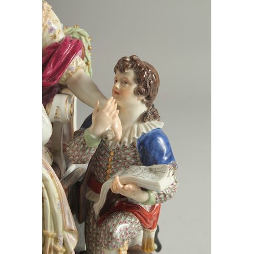 1098 - A VERY GOOD AND FINE 19TH CENTURY MEISSEN GROUP, a lady seated in a chair, a child on her lap, a you... 