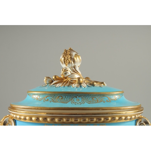 1099 - A SUPERB SEVRES DESIGN OVAL TUREEN AND COVER with pale blue ground edged in gilt, the sides with rev... 