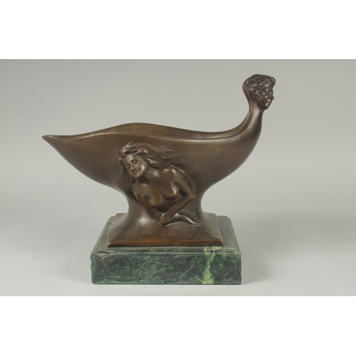 1122 - A BRONZE ABSTRACT OVAL BOWL on a marble base.