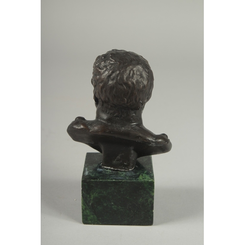 1123 - A BRONZE ROMAN MAN on a marble base.