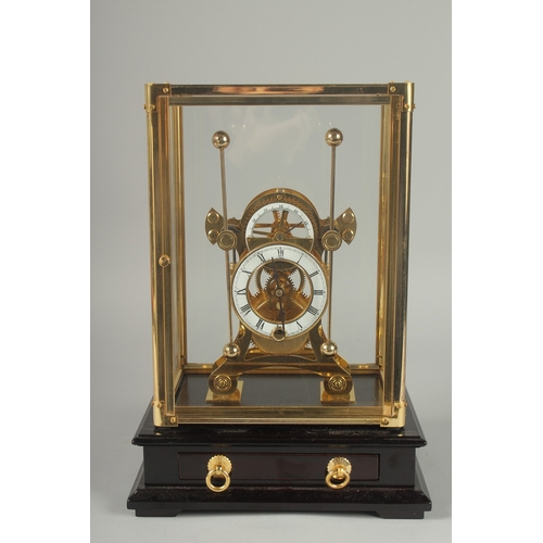 1131 - A GRASSHOPPER SKELETON CLOCK in a glass case.  13ins high overall.