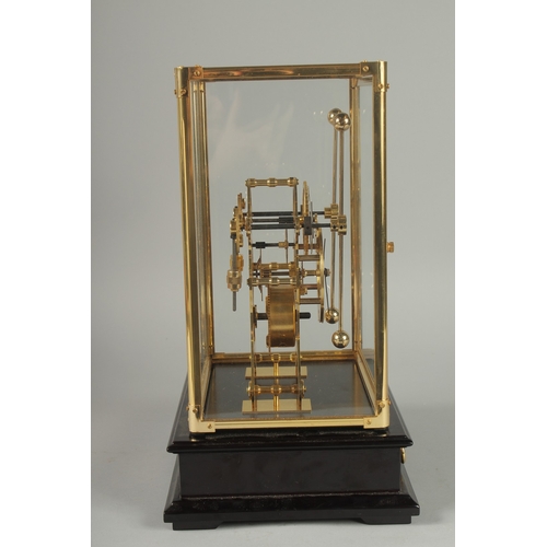 1131 - A GRASSHOPPER SKELETON CLOCK in a glass case.  13ins high overall.