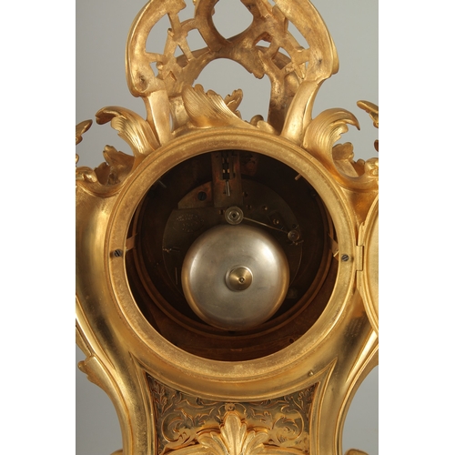 1133 - A GOOD LOUIS XVITH STYLE ORMOLU CLOCK GARNITURE the clock with Roman numerals and acanthus scrolls. ... 