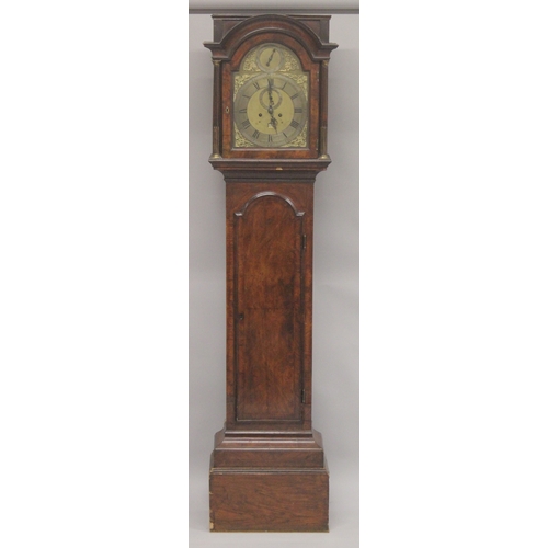 1134 - AN 18TH CENTURY WALNUT LONG CASE CLOCK with eight day movement, the arch brass dial with strike/sile... 