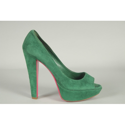 1371 - A PAIR OF MIU MIU GREEN SUEDE SHOES. Size UK 37, boxed.