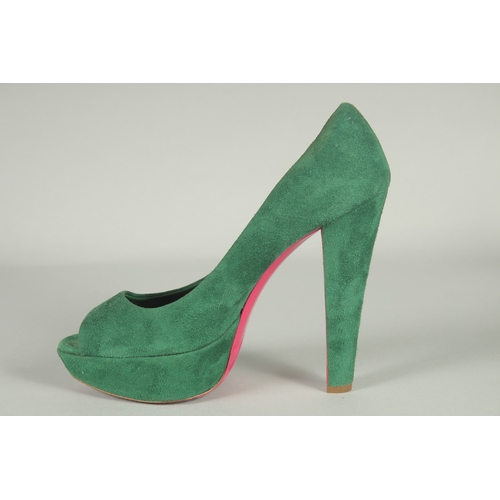 1371 - A PAIR OF MIU MIU GREEN SUEDE SHOES. Size UK 37, boxed.