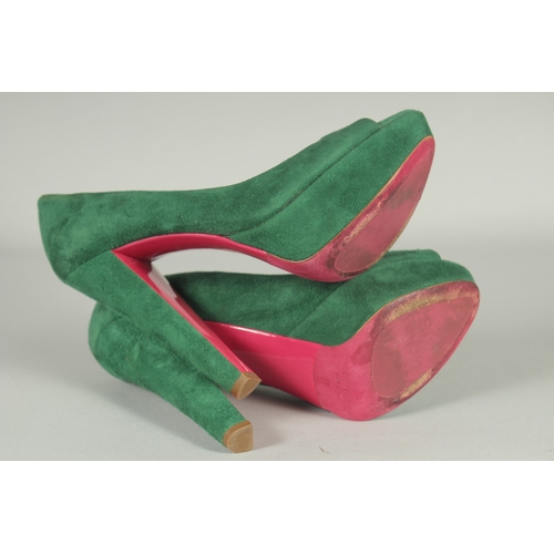 1371 - A PAIR OF MIU MIU GREEN SUEDE SHOES. Size UK 37, boxed.