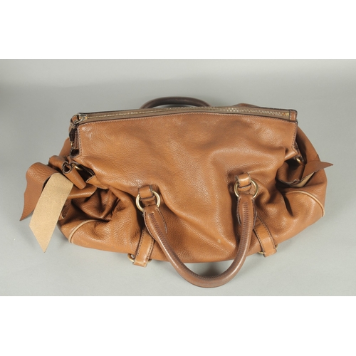 1372 - A LARGE MIU MIU SOFT BROWN LEATHER BAG. 16ins long.