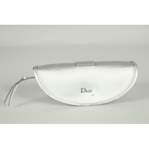 1374 - A PAIR OF BLACK DIOR SUN GLASSES in a case.