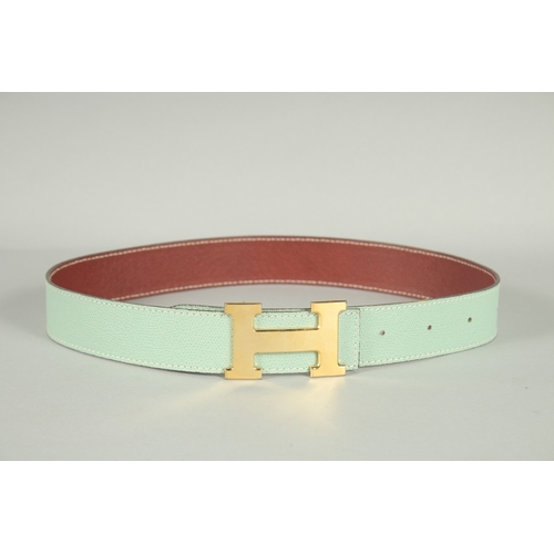 1376 - A HERMES LEATHER BELT. 35ins long.