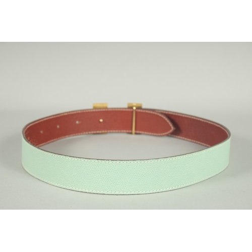 1376 - A HERMES LEATHER BELT. 35ins long.