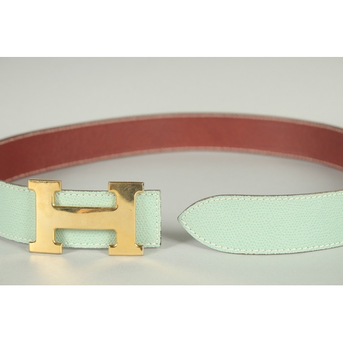 1376 - A HERMES LEATHER BELT. 35ins long.