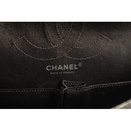 1381 - A VERY GOOD CHANEL METALLIC BRONZE PADDED HAND BAG. 10.8ins long, 8ins deep with a long entwined han... 