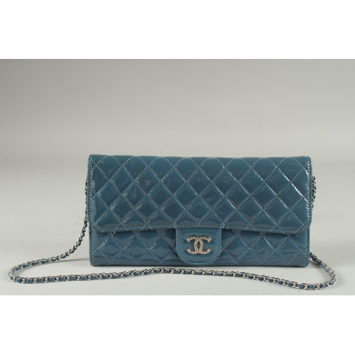 1382 - A VERY GOOD CHANEL BLUE PATENT LEATHER HAND BAG with double C medallion. 9.5ins long, 4.75ins deep w... 