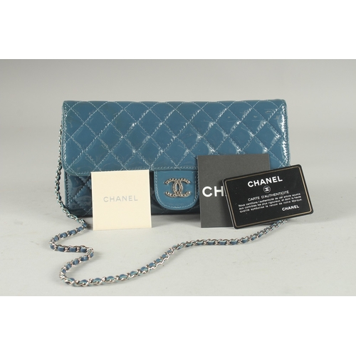 1382 - A VERY GOOD CHANEL BLUE PATENT LEATHER HAND BAG with double C medallion. 9.5ins long, 4.75ins deep w... 