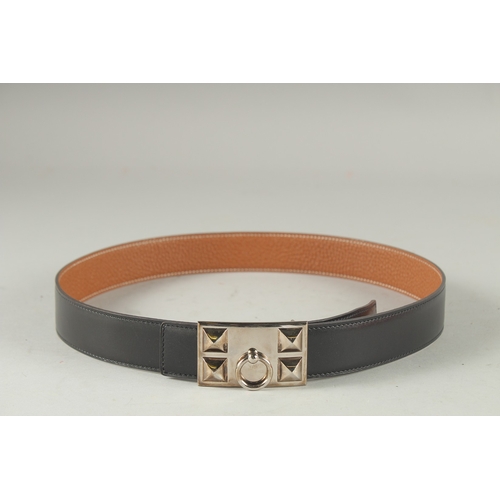 1384 - A BROWN LEATHER HERMES PARIS BELT.  36ins long.