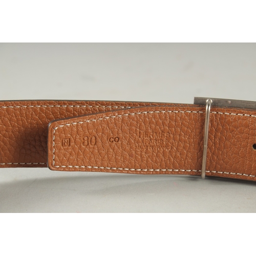 1384 - A BROWN LEATHER HERMES PARIS BELT.  36ins long.