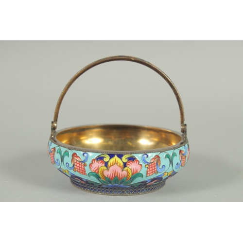 1406 - A RUSSIAN CIRCULAR SILVER AND ENAMEL SUGAR BASKET with swivel handles. 10.5cm diameter, 3.5cm deep. ... 