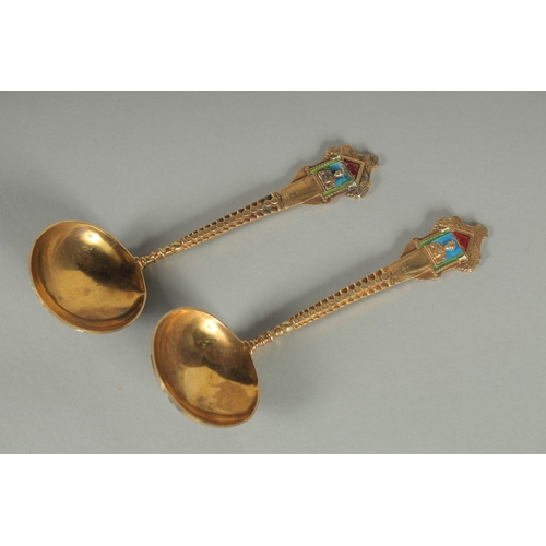 1417 - A PAIR OF RUSSIAN SILVER AND ENAMEL SPOONS.  18cm long. Weight: 112gms.