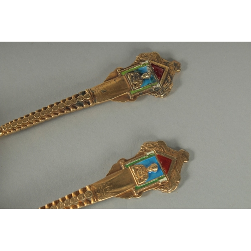 1417 - A PAIR OF RUSSIAN SILVER AND ENAMEL SPOONS.  18cm long. Weight: 112gms.