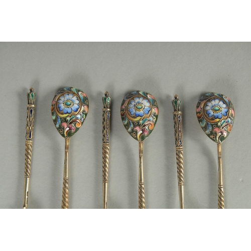 1418 - A SET OF SIX RUSSIAN SILVER AND ENAMEL SPOONS.  10.5cm long. Marks: 84. K.P. Weight: 60gms.