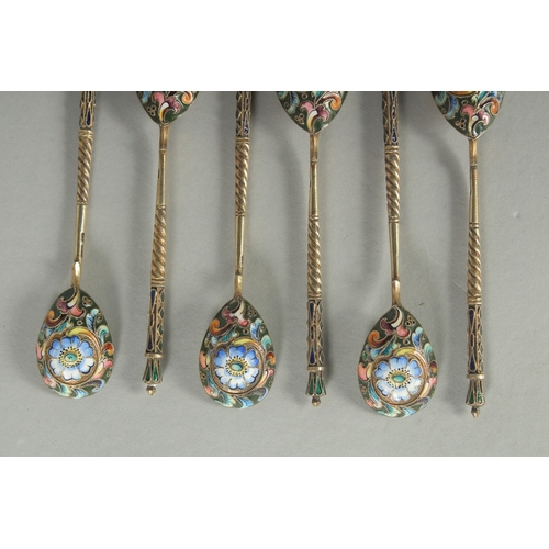 1418 - A SET OF SIX RUSSIAN SILVER AND ENAMEL SPOONS.  10.5cm long. Marks: 84. K.P. Weight: 60gms.