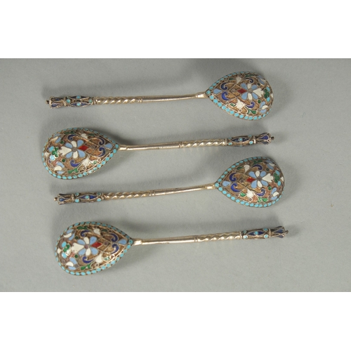 1420 - A SET OF FOUR RUSSIAN SILVER AND ENAMEL SPOONS. 10.5cm long. Marks: Head, 84. Weight: 42gms.