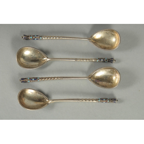 1420 - A SET OF FOUR RUSSIAN SILVER AND ENAMEL SPOONS. 10.5cm long. Marks: Head, 84. Weight: 42gms.