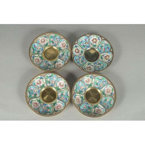 1433 - A GOOD SET OF FOUR RUSSIAN SILVER AND ENAMEL SAUCERS. 11.5cm diameter. Mark: Head, 84, A.C. over 189... 