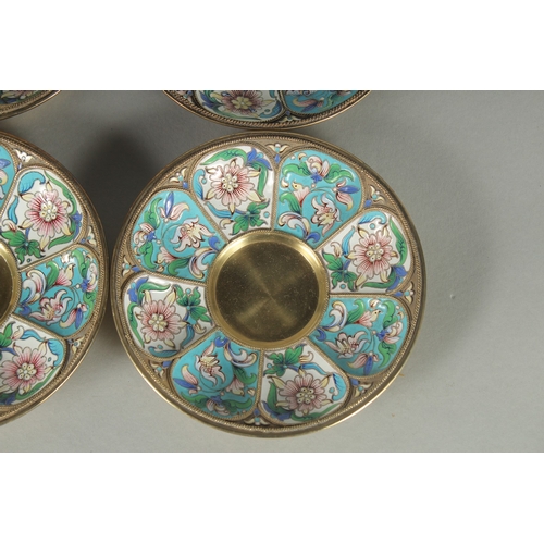 1433 - A GOOD SET OF FOUR RUSSIAN SILVER AND ENAMEL SAUCERS. 11.5cm diameter. Mark: Head, 84, A.C. over 189... 