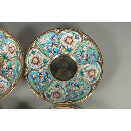 1433 - A GOOD SET OF FOUR RUSSIAN SILVER AND ENAMEL SAUCERS. 11.5cm diameter. Mark: Head, 84, A.C. over 189... 