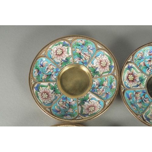 1433 - A GOOD SET OF FOUR RUSSIAN SILVER AND ENAMEL SAUCERS. 11.5cm diameter. Mark: Head, 84, A.C. over 189... 