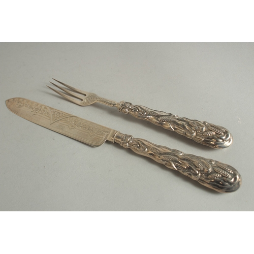 1821 - A VICTORIAN CAST SILVER CHRISTENING KNIFE AND FORK. Birmingham 1871.