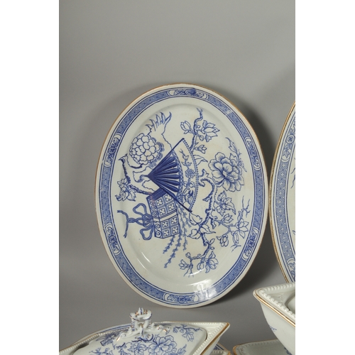 1094 - A CHRISTOPHER DRESSER DESIGN BLUE AND WHITE PART DINNER SET COMPRISING: Three oval dishes, 18ins, 16... 