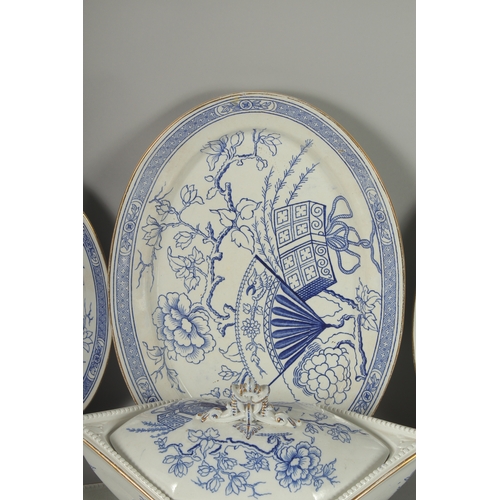 1094 - A CHRISTOPHER DRESSER DESIGN BLUE AND WHITE PART DINNER SET COMPRISING: Three oval dishes, 18ins, 16... 