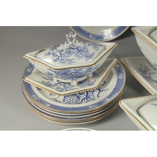 1094 - A CHRISTOPHER DRESSER DESIGN BLUE AND WHITE PART DINNER SET COMPRISING: Three oval dishes, 18ins, 16... 