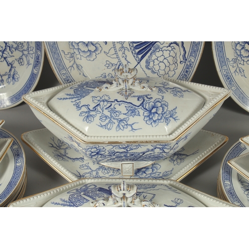 1094 - A CHRISTOPHER DRESSER DESIGN BLUE AND WHITE PART DINNER SET COMPRISING: Three oval dishes, 18ins, 16... 