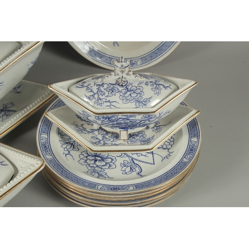 1094 - A CHRISTOPHER DRESSER DESIGN BLUE AND WHITE PART DINNER SET COMPRISING: Three oval dishes, 18ins, 16... 