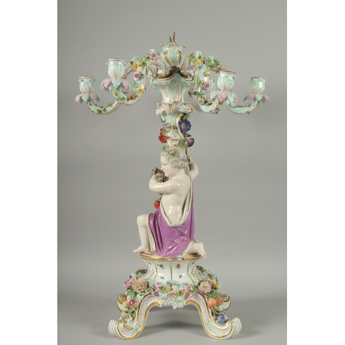 1100 - A SUPERB MEISSEN PORCELAIN CANDELABRA MUDEL VON ERNST, AUGUST LEUTERITZ.1862 -1885. The stem with a ... 