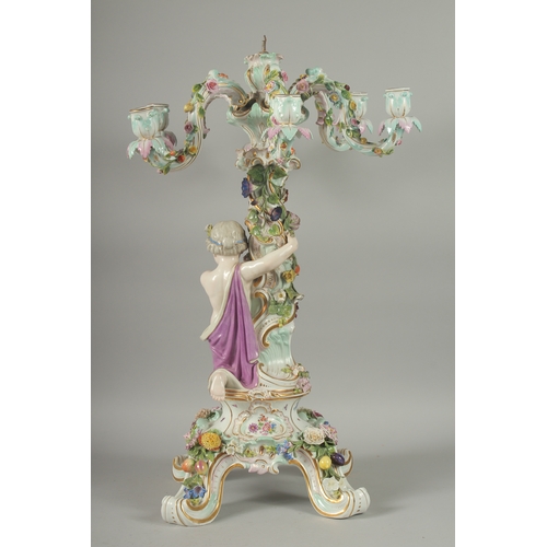 1100 - A SUPERB MEISSEN PORCELAIN CANDELABRA MUDEL VON ERNST, AUGUST LEUTERITZ.1862 -1885. The stem with a ... 