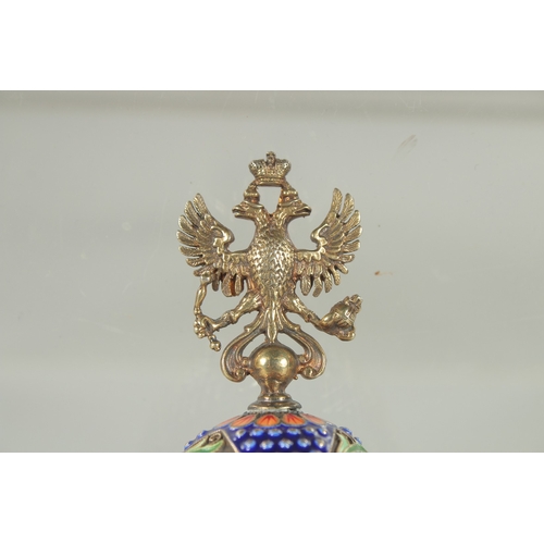 1424 - A RUSSIAN SILVER AND ENAMEL EGG (matching previous lot). 10cm long Mark: Head, 84, C.K. Weight: 64gm... 