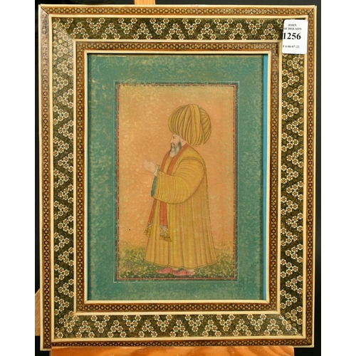 290 - A PERSIAN QAJAR MINIATURE PAINTING OF A FIGURE, in a micro mosaic inlaid frame, glazed, 12.5