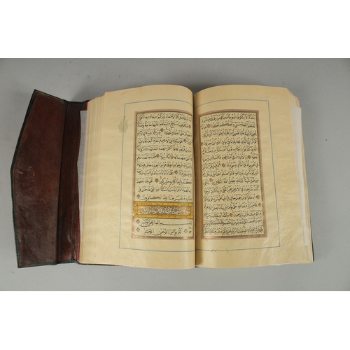 243 - A 19TH CENTURY OTTOMAN TURKISH QURAN, signed Hafiz Uthman al-Fawzi and dated 1258H./1842
Fifteen lin... 