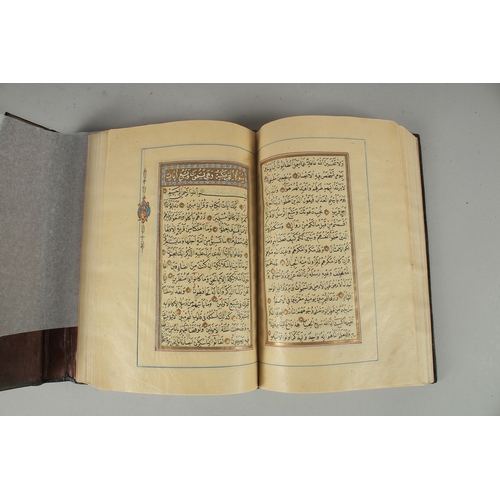 243 - A 19TH CENTURY OTTOMAN TURKISH QURAN, signed Hafiz Uthman al-Fawzi and dated 1258H./1842
Fifteen lin... 