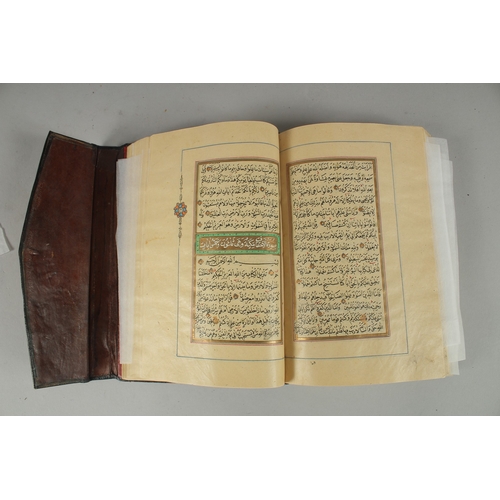 243 - A 19TH CENTURY OTTOMAN TURKISH QURAN, signed Hafiz Uthman al-Fawzi and dated 1258H./1842
Fifteen lin... 