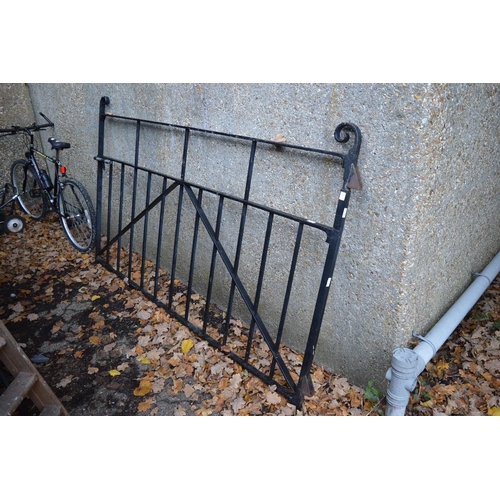 11 - A large wrought iron gate.