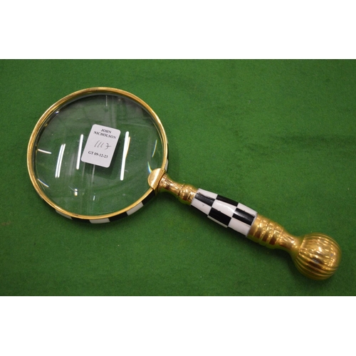 1117 - A magnifying glass.